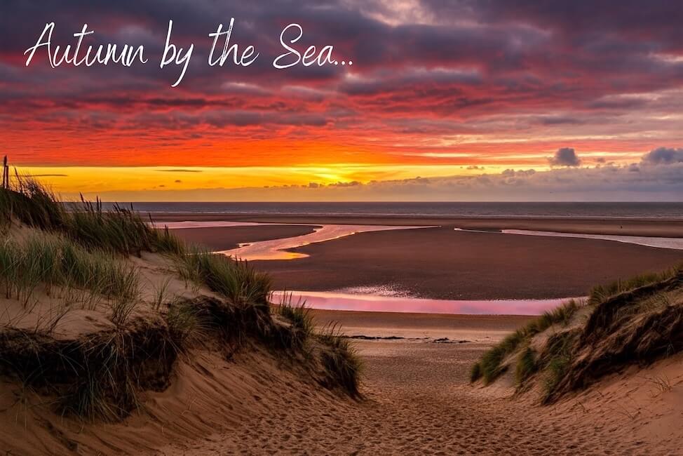 autumnal sunrise over a deserted camber beach