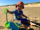 Kids building sandcastles in Camber Sands